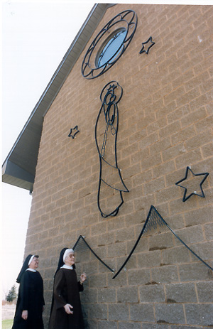 Sr. Mary Anne and Sr. Mary Jo in front of the chapel 